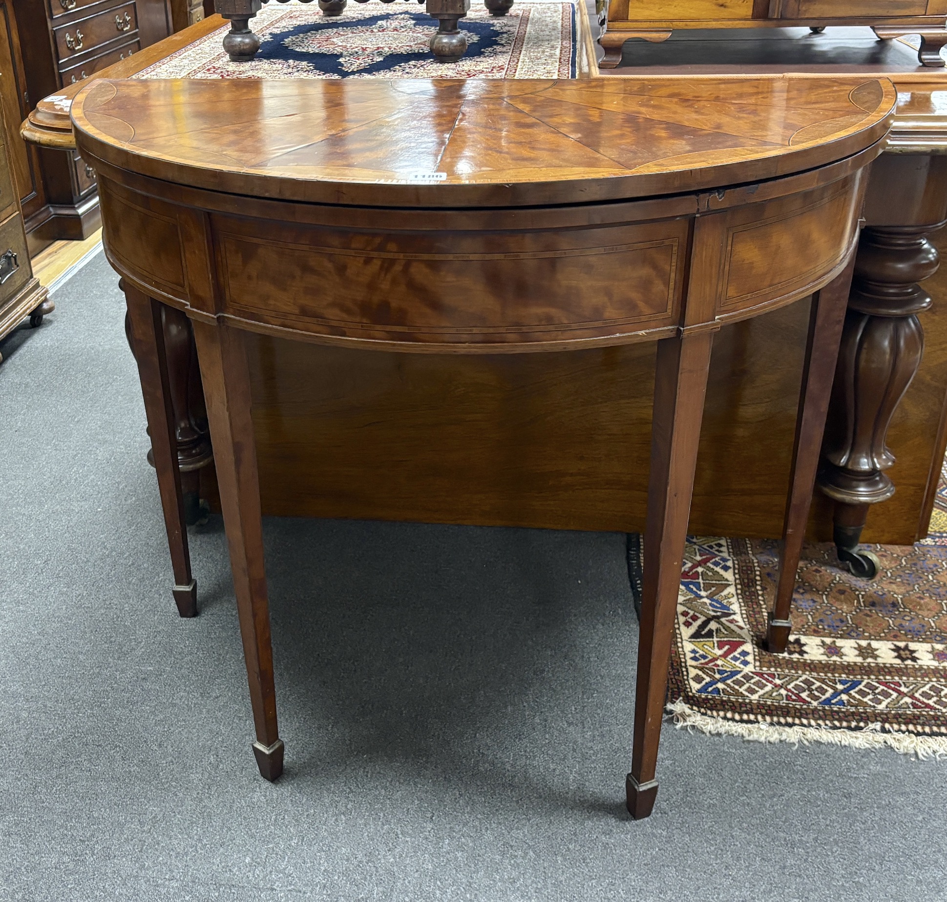 A George III satinwood D shape folding card table, width 92cm, depth 46cm, height 77cm